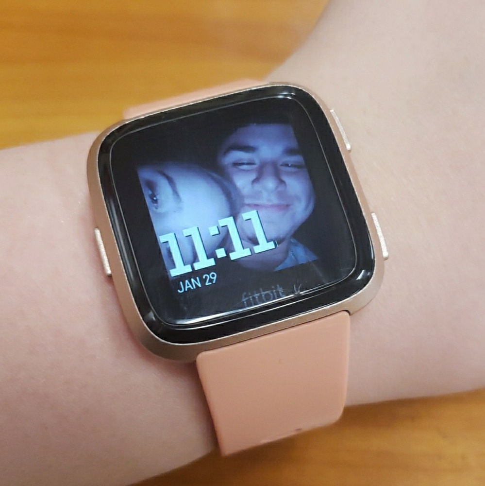 Rose gold Fitbit versa